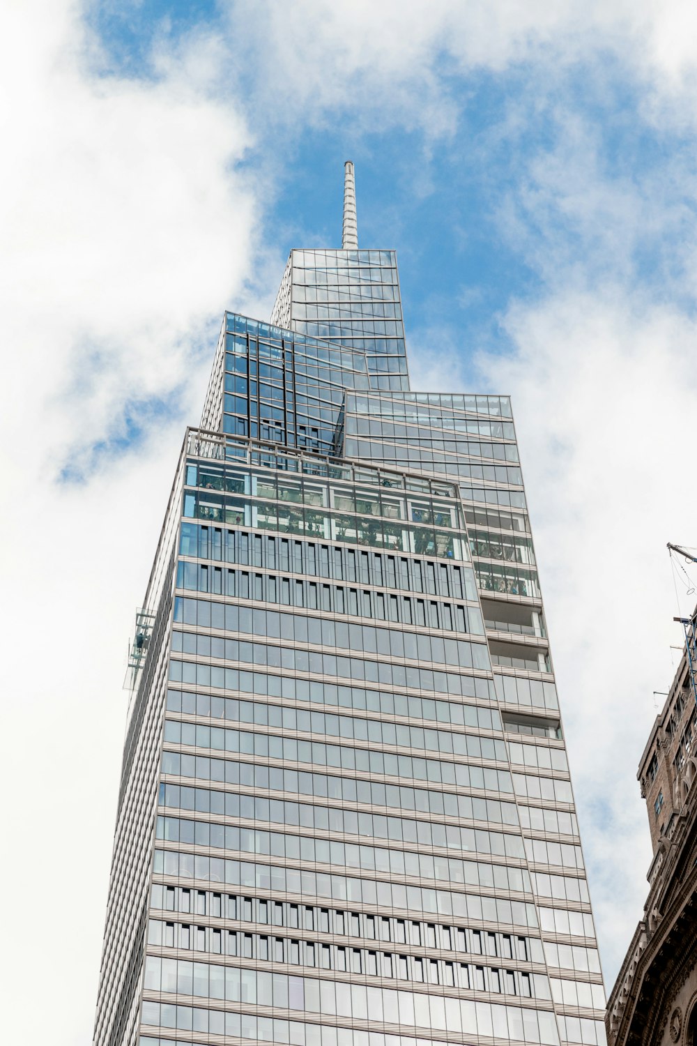 a very tall building with a sky background