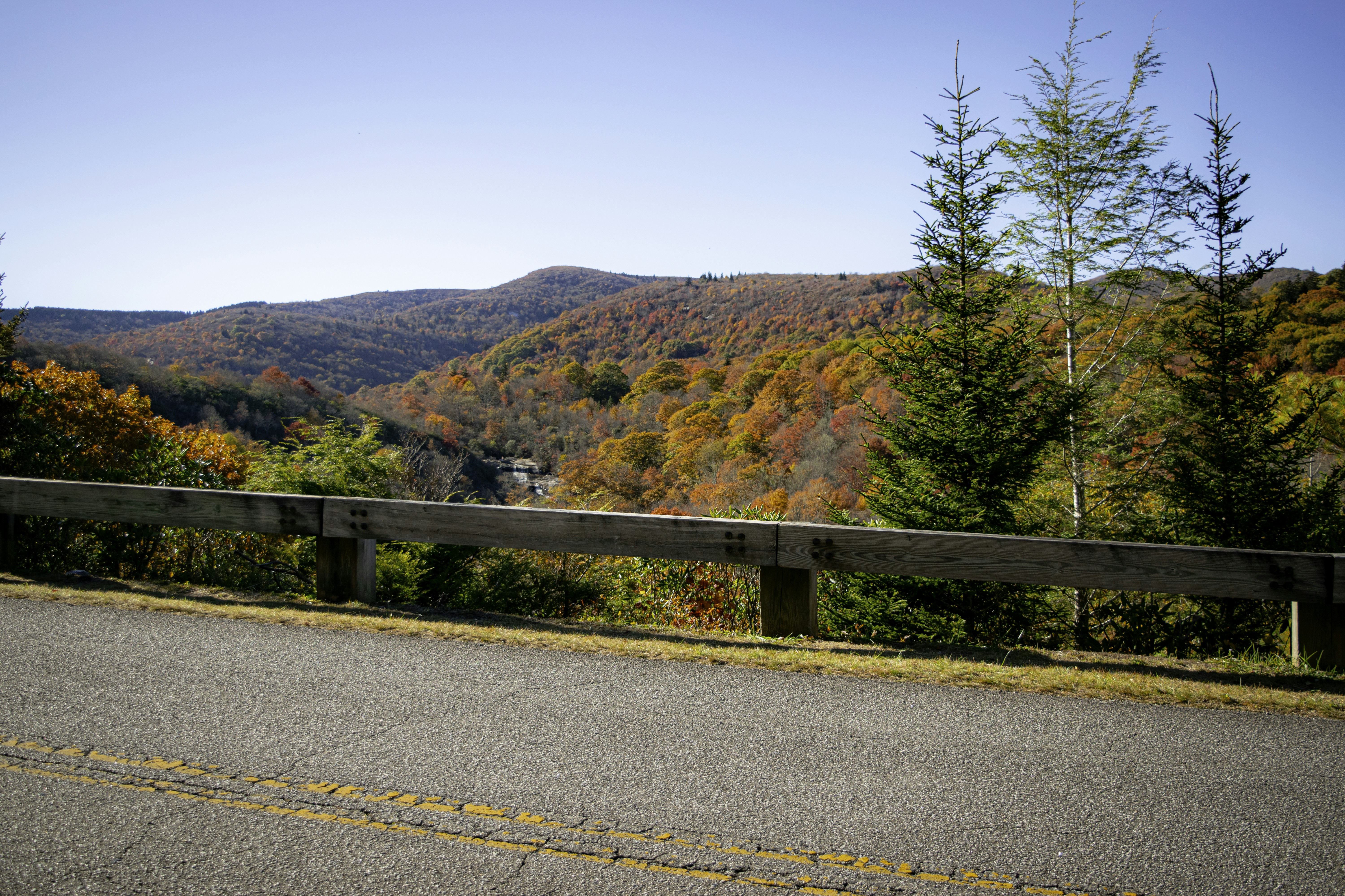 a view of the mountains from a road