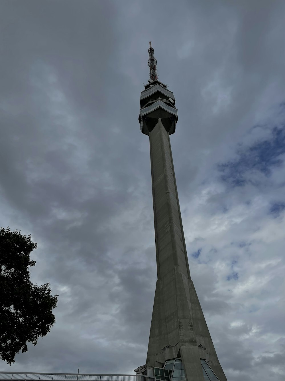 a tall tower with a clock on top of it