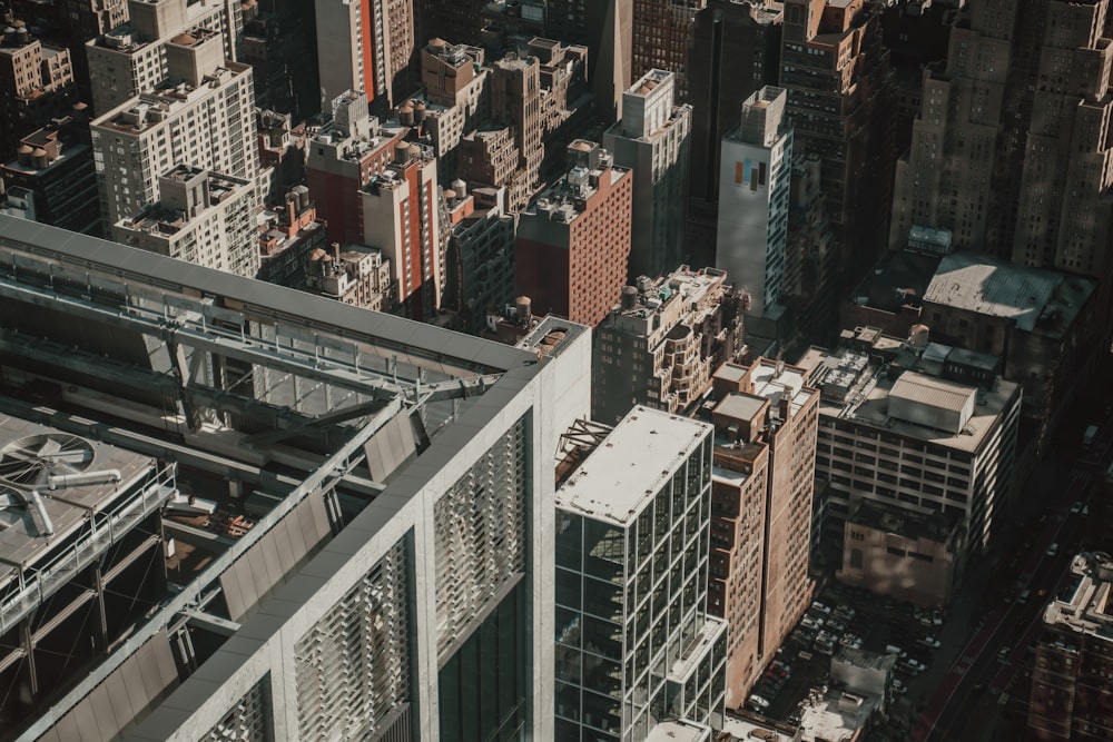 an aerial view of a city with tall buildings