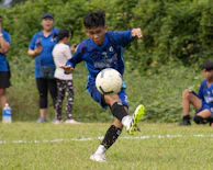 Dynamic shot of a soccer uniform featuring modern design and vibrant blue highlights.
