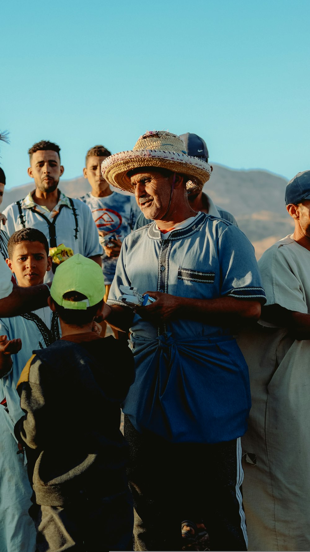 a group of men standing next to each other