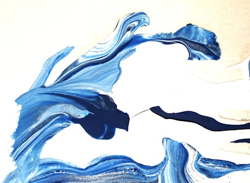 Abstract art representing flowing air currents in soft blues and whites.