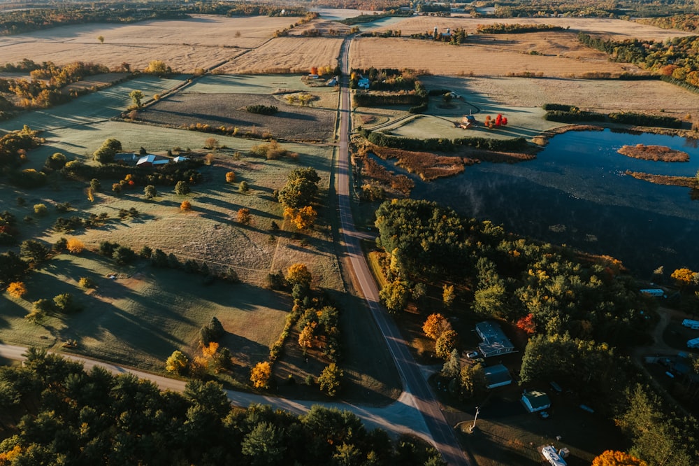 an aerial view of a rural area with a river running through it