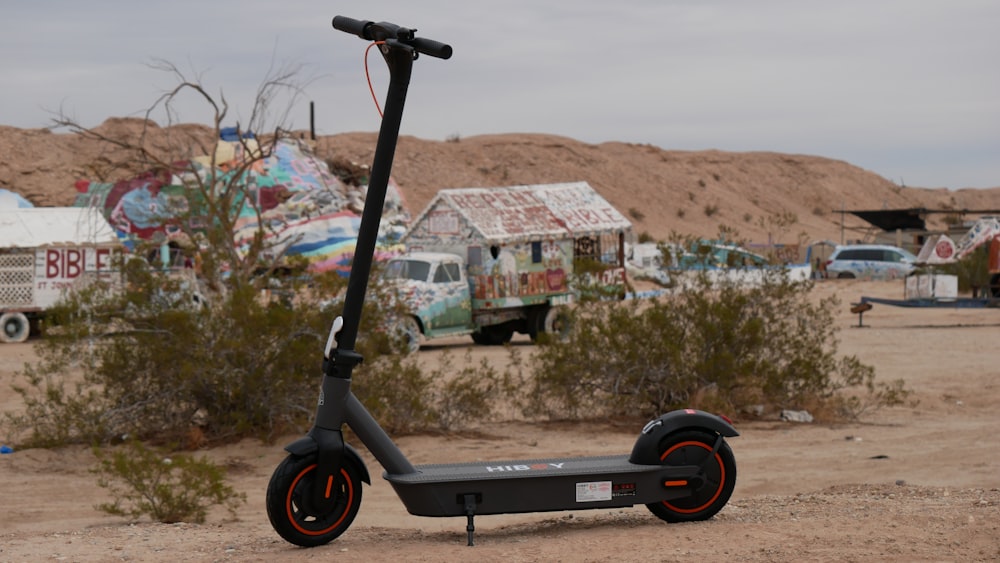 a scooter is parked in the middle of a desert
