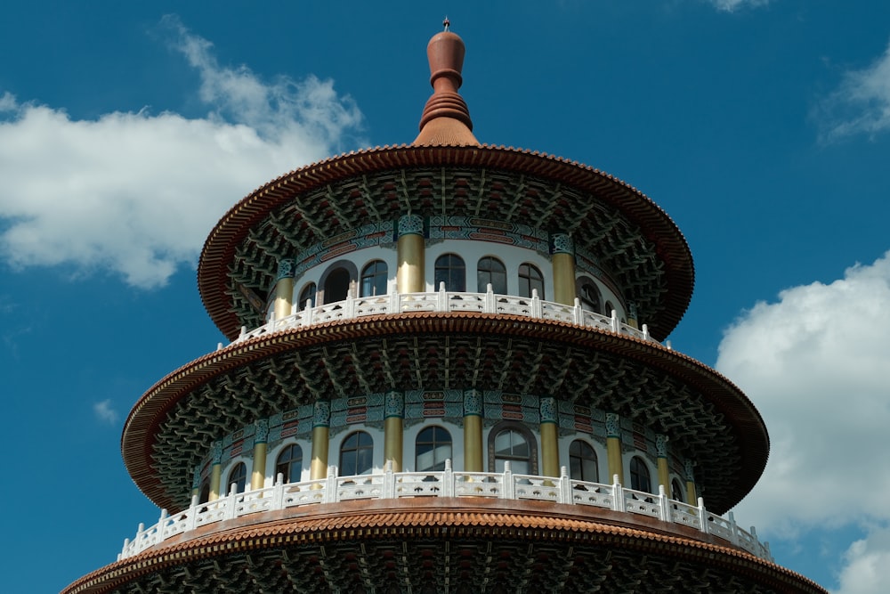 a tall tower with a sky in the background