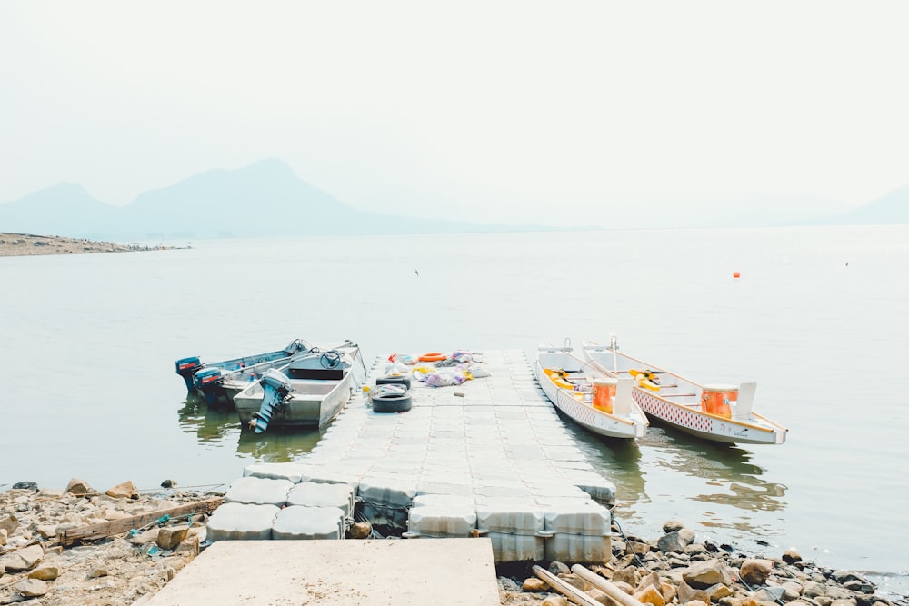 a couple of boats that are sitting in the water