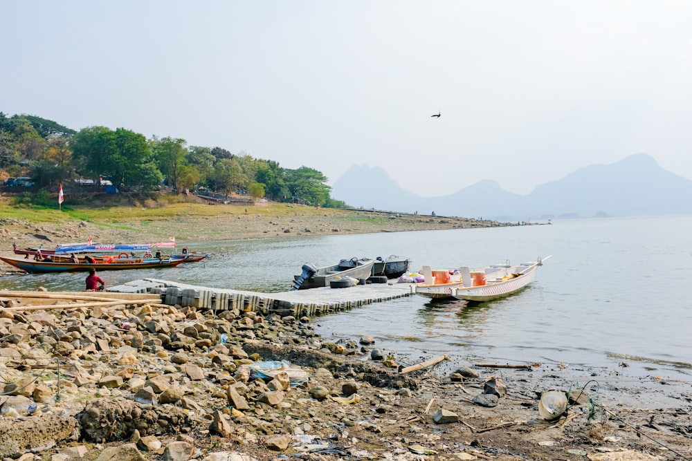 a couple of boats that are sitting in the water