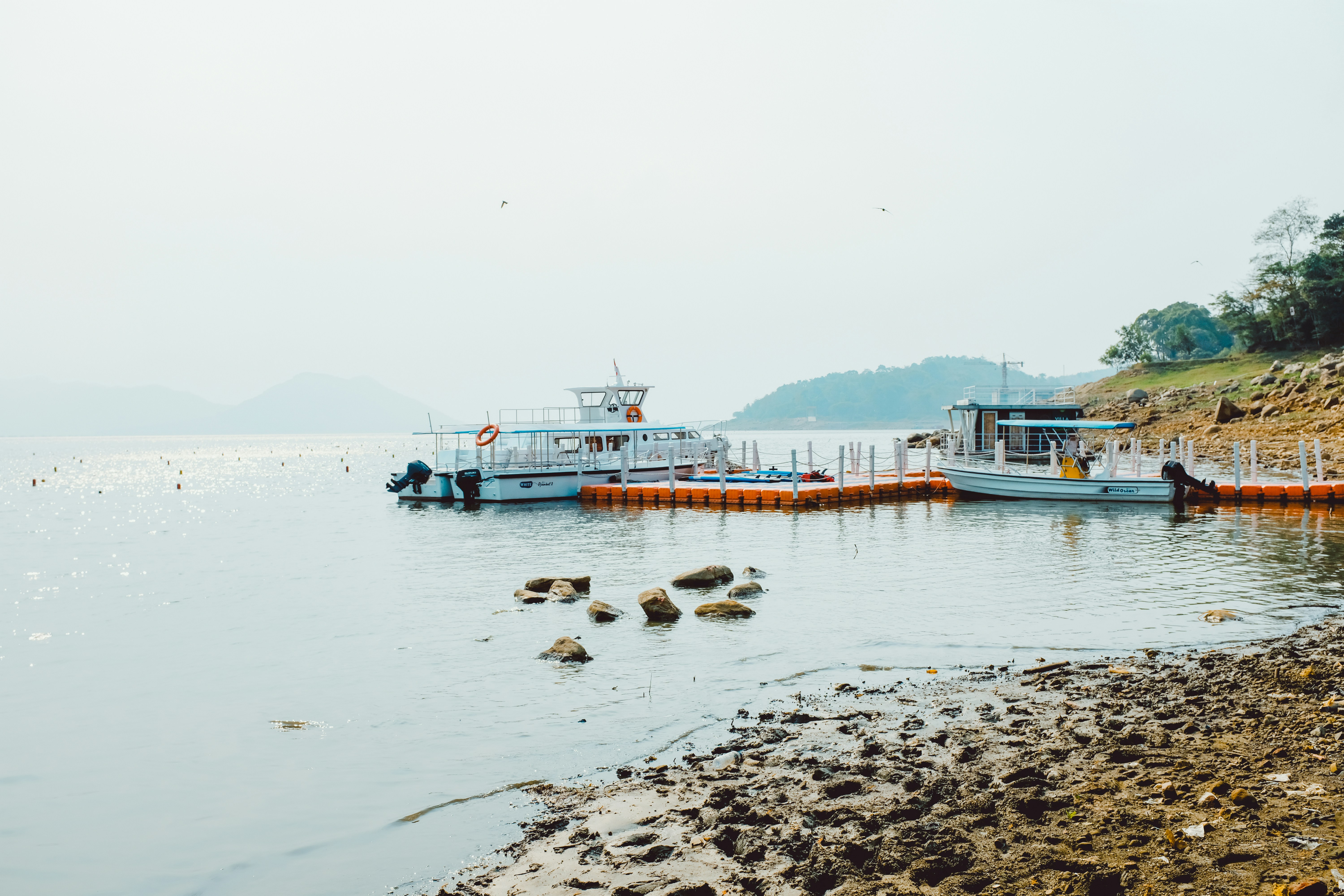 a couple of boats that are sitting in the water