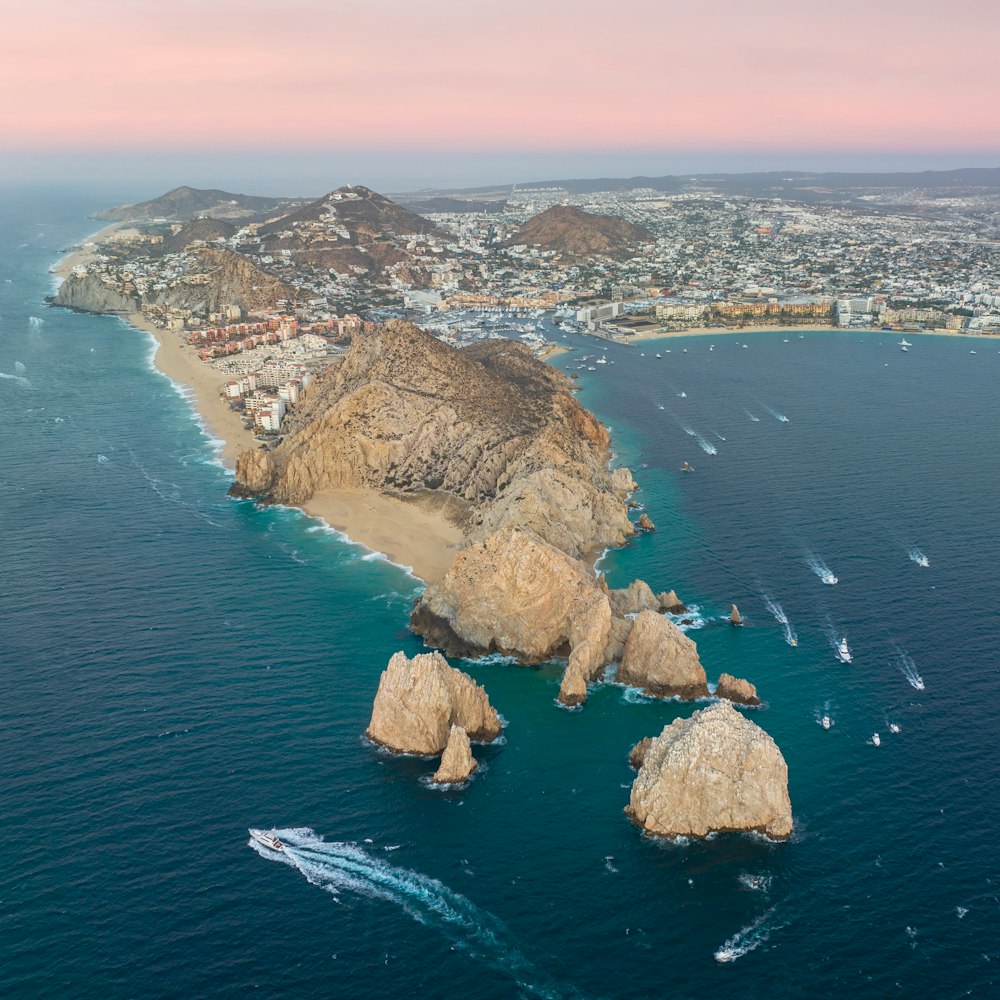 an aerial view of the coastline of a city