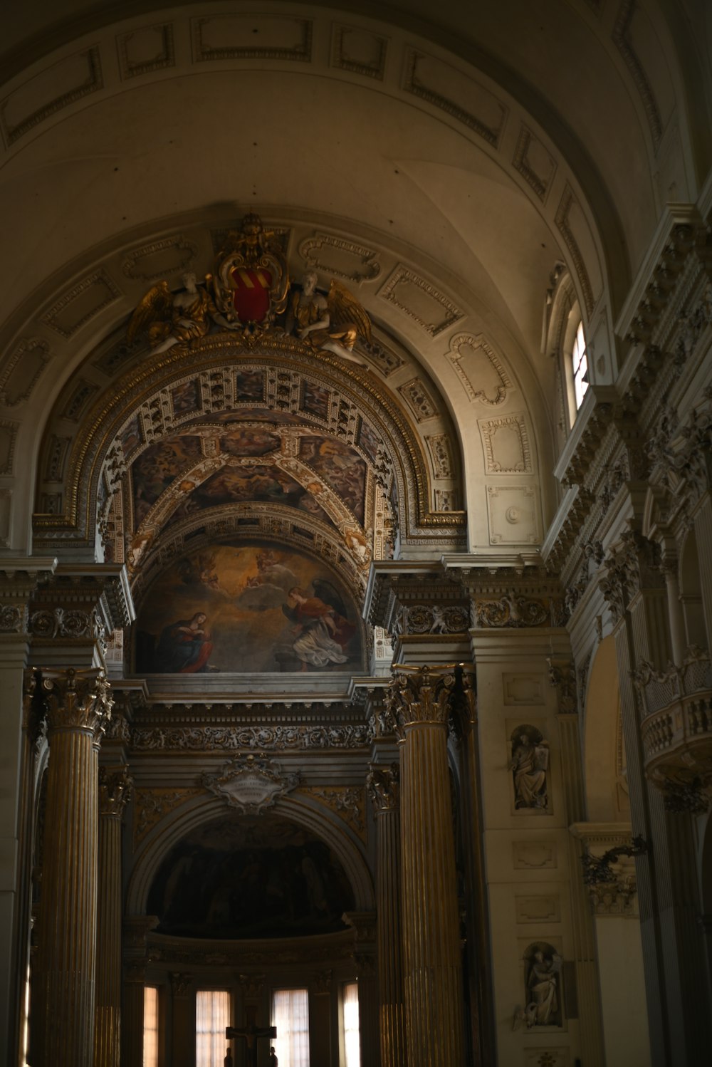 a large room with a painting on the wall