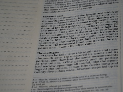 A close-up of a page from a book, showing text written in English. The layout includes a margin with dotted lines on the left and text blocks discussing architectural measurements.