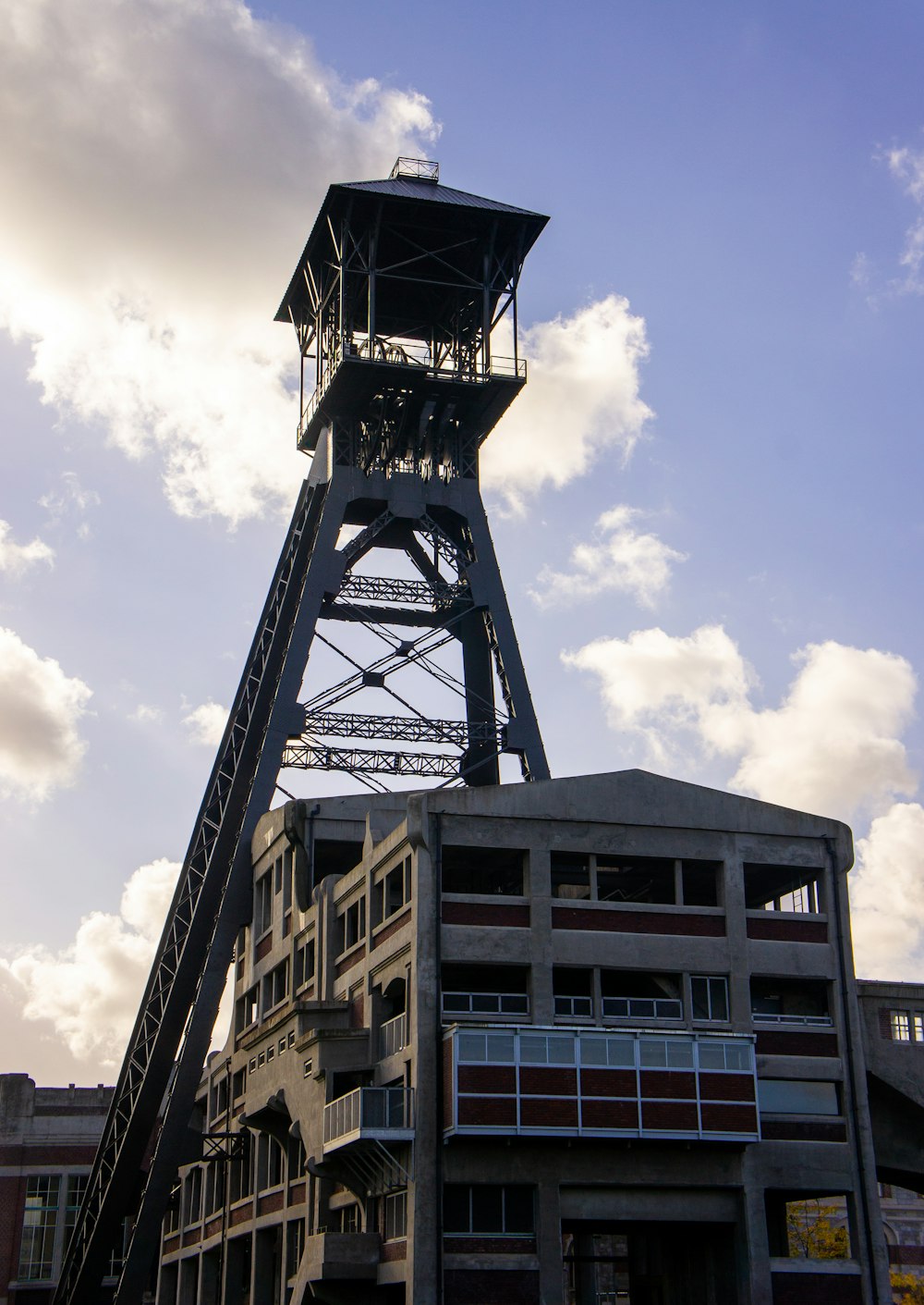 a tall tower with a clock on top of it