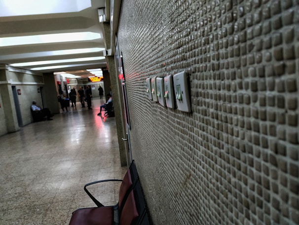 A hallway showcasing smart switches and control panels blending into the décor.