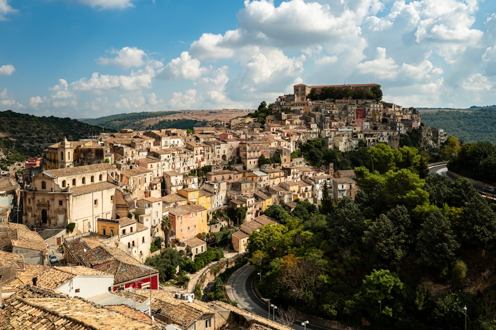 a town with a hill in the background