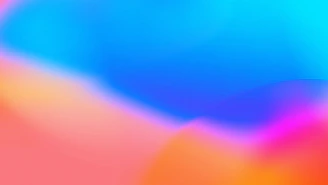 a blurry image of a blue and pink background