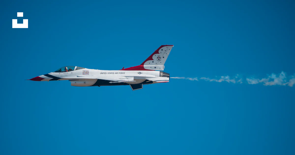 Jet Through Isc A fighter jet flying through a blue sky photo – Free Salinas Image on ...