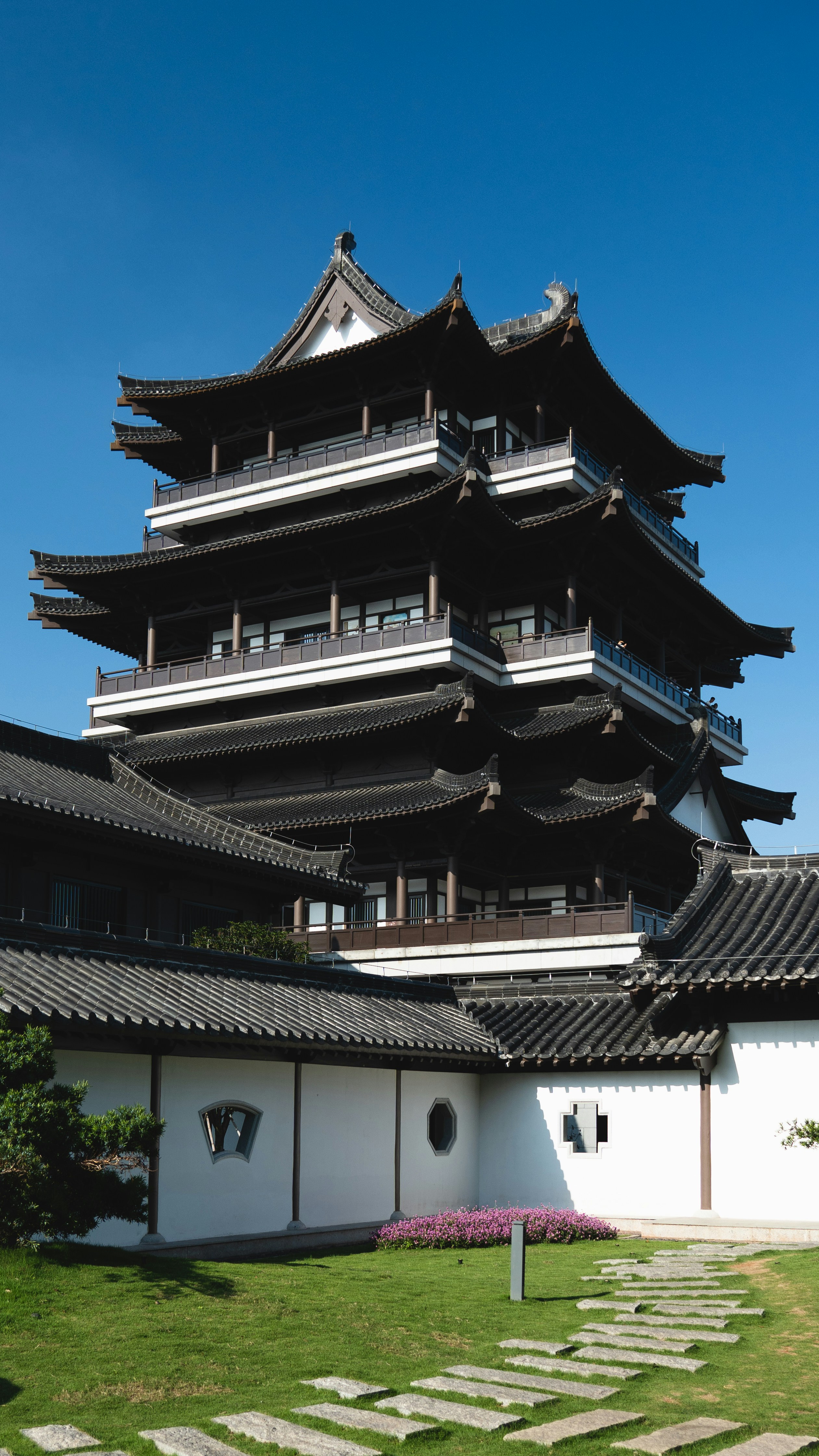 a tall building with a lot of windows on top of it