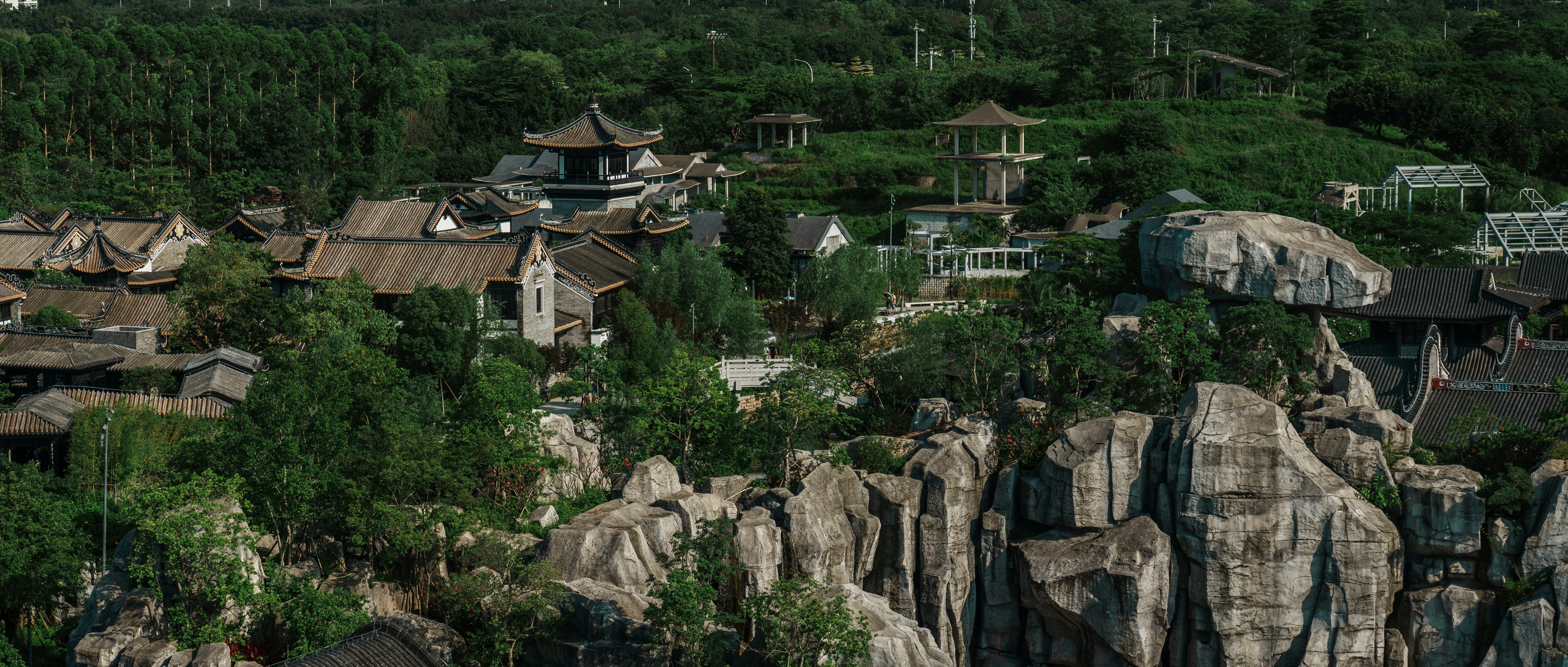 an aerial view of a village in the mountains