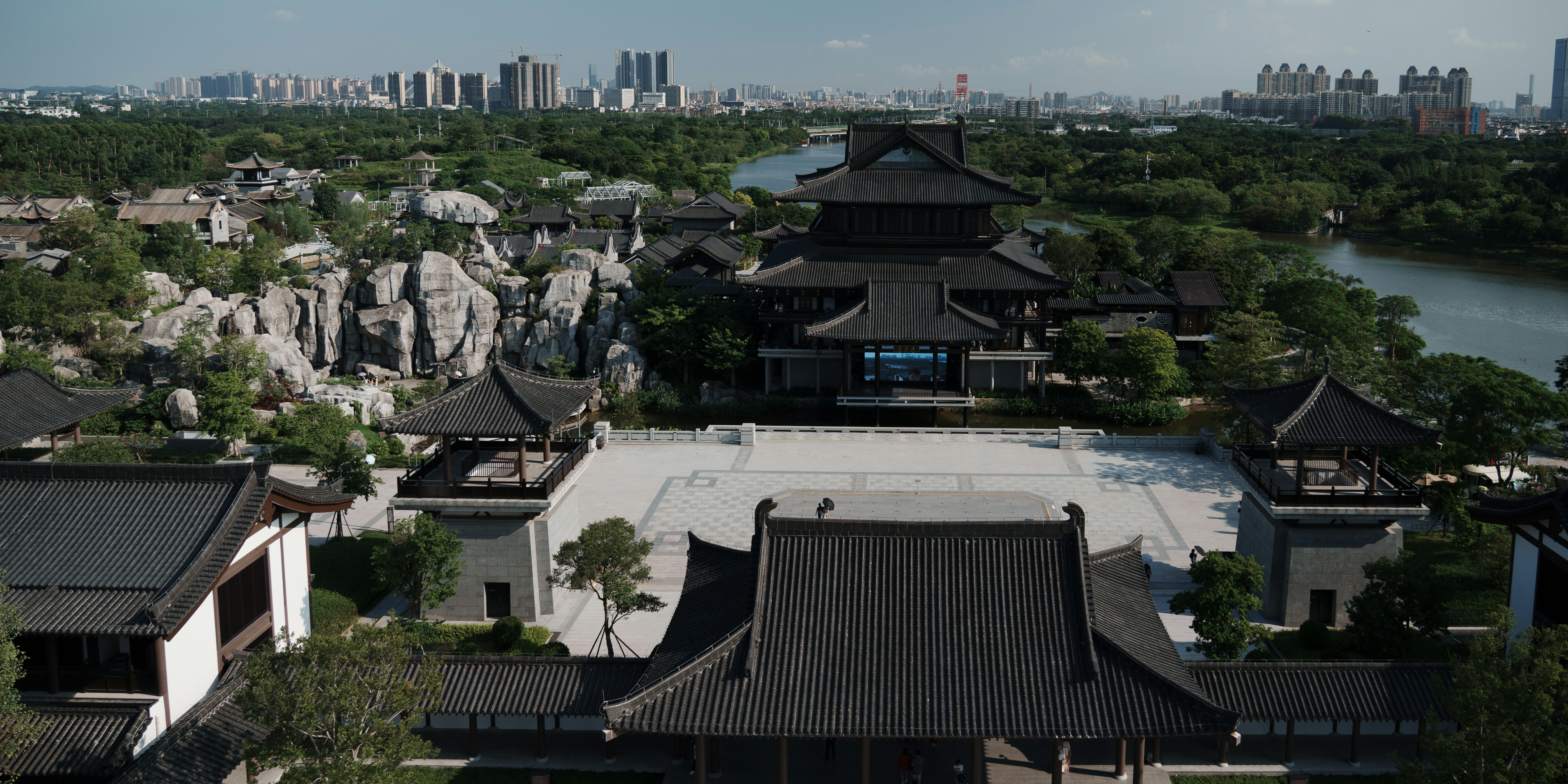 an aerial view of a city with a river running through it