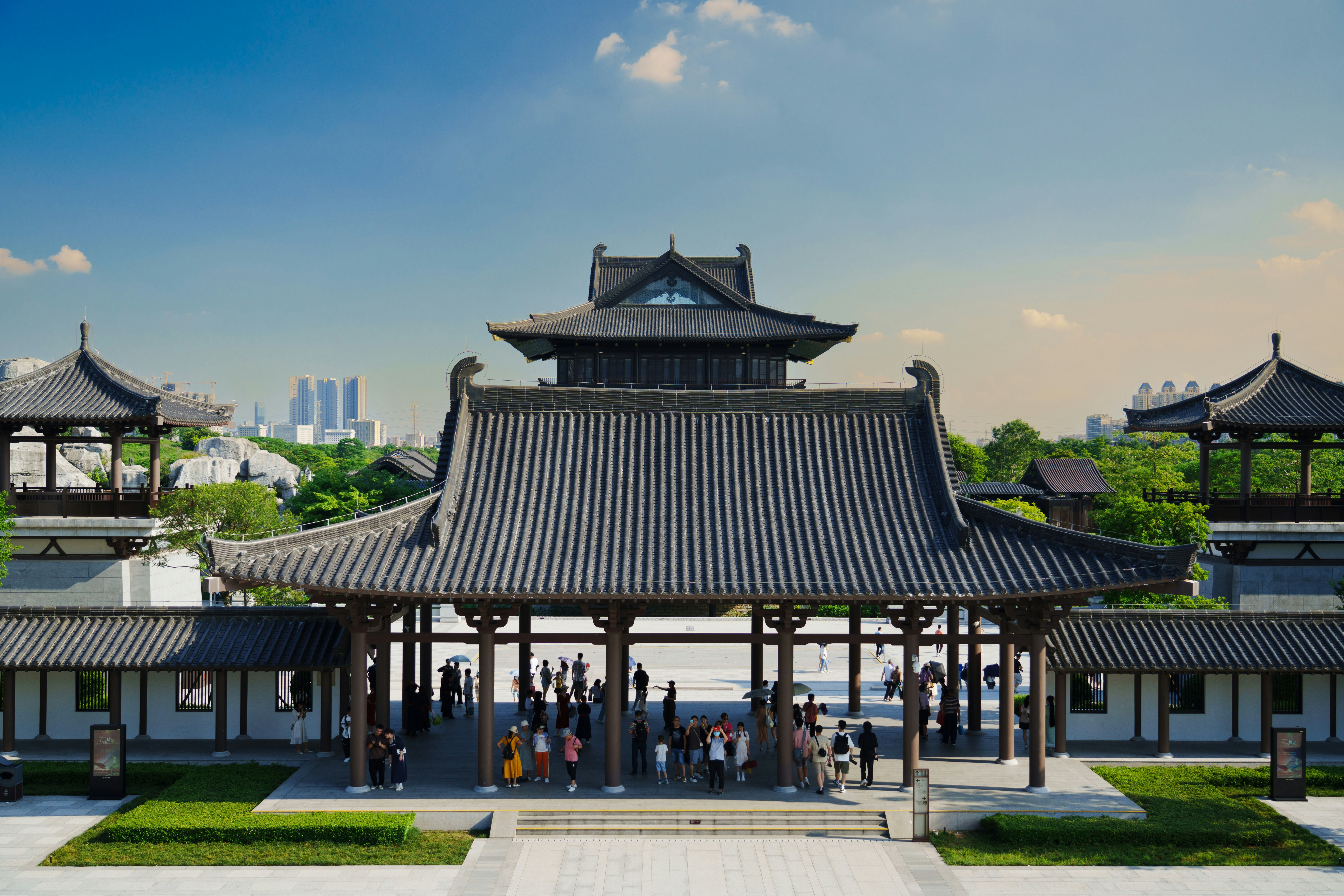 a group of people standing in front of a building