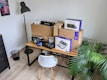 An organized workspace featuring various computer hardware components.
