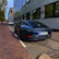 Luxurious Porsche parked on a city street, freshly detailed with a mirror-like finish.