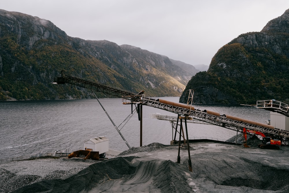 a conveyor belt sitting on top of a large body of water