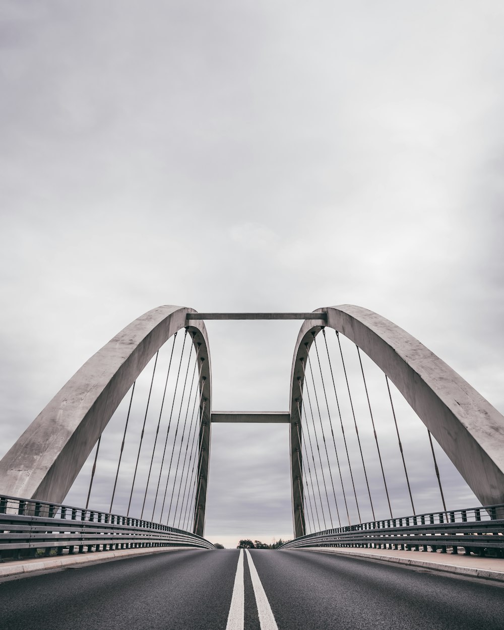 a bridge that is going over a road