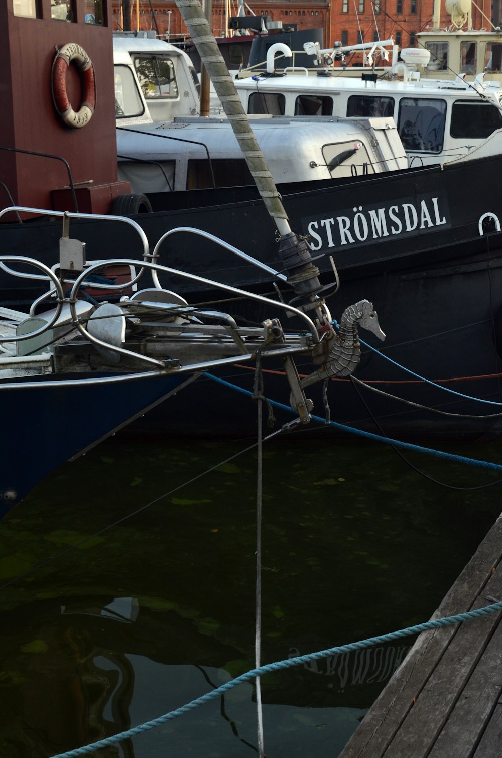 a group of boats docked in a harbor