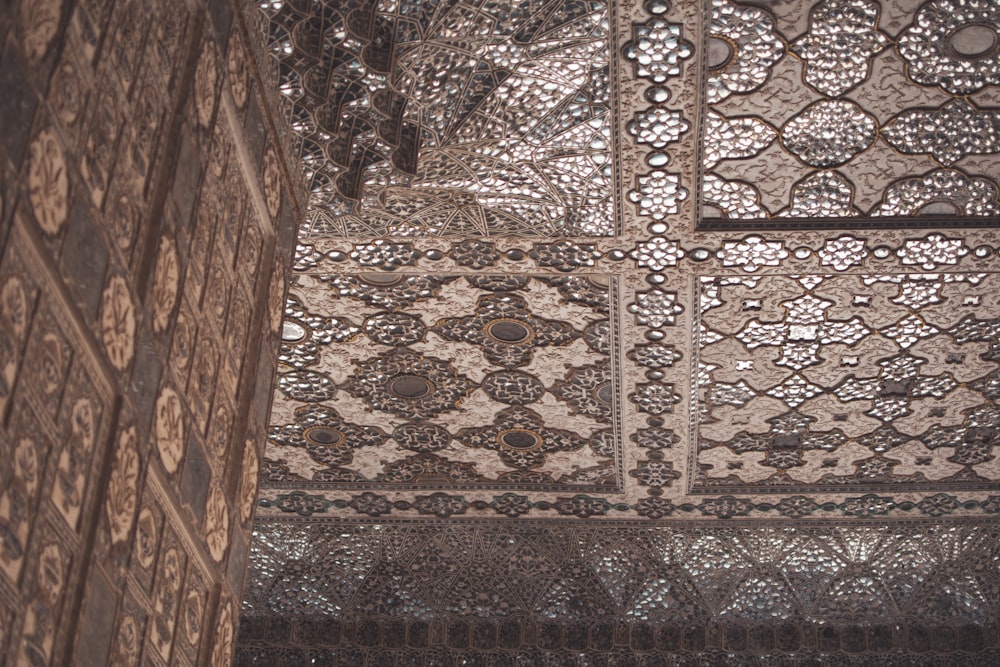 an intricately designed ceiling in a building