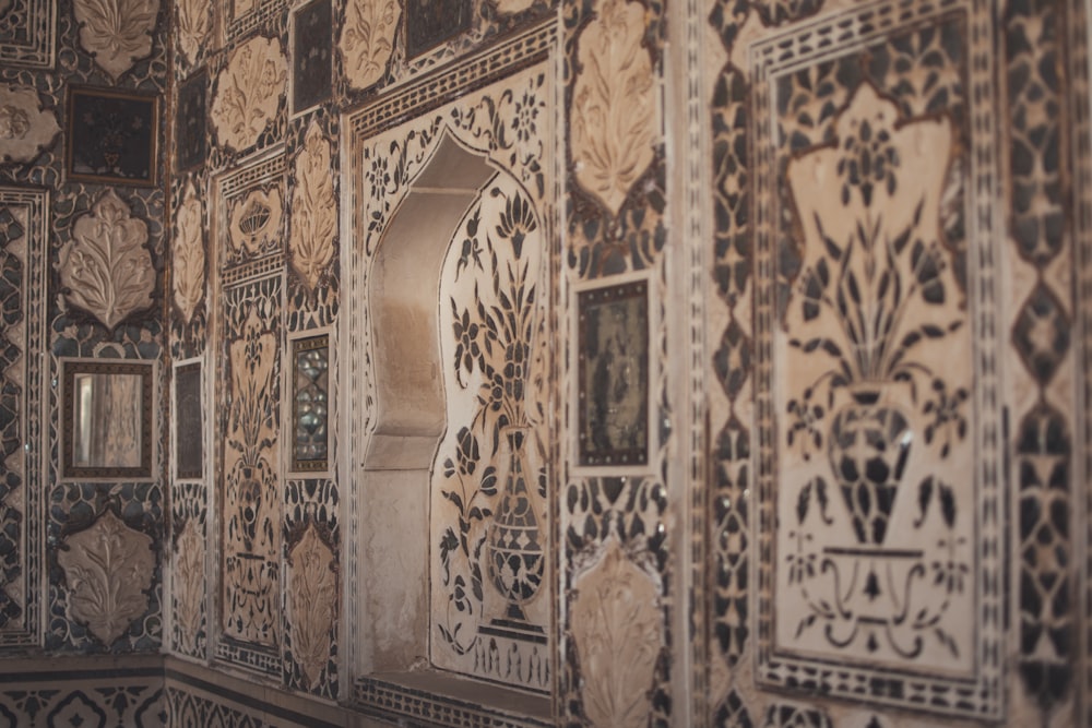 an intricately decorated wall in a building