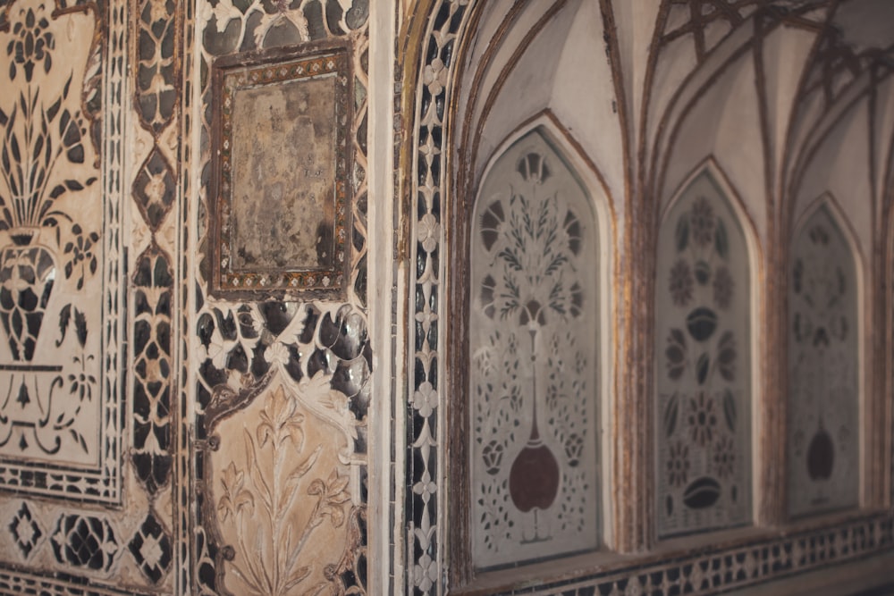 a close up of a wall with a clock on it