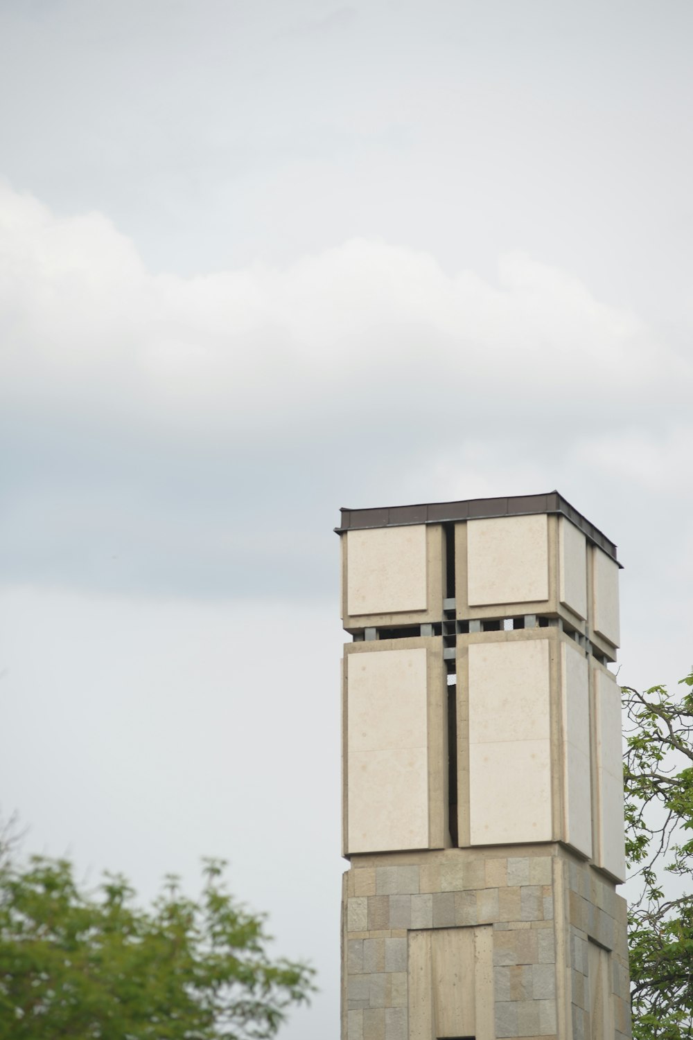 a tall tower with a clock on top of it