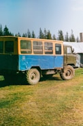 Crew shuttle bus parked in a remote field