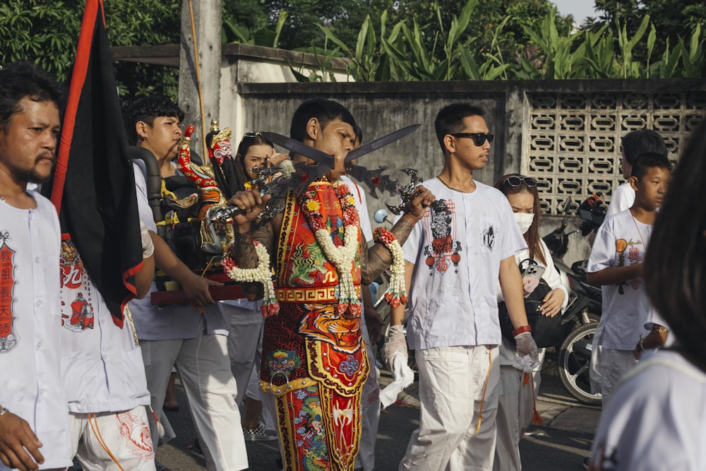 a group of people walking down a street