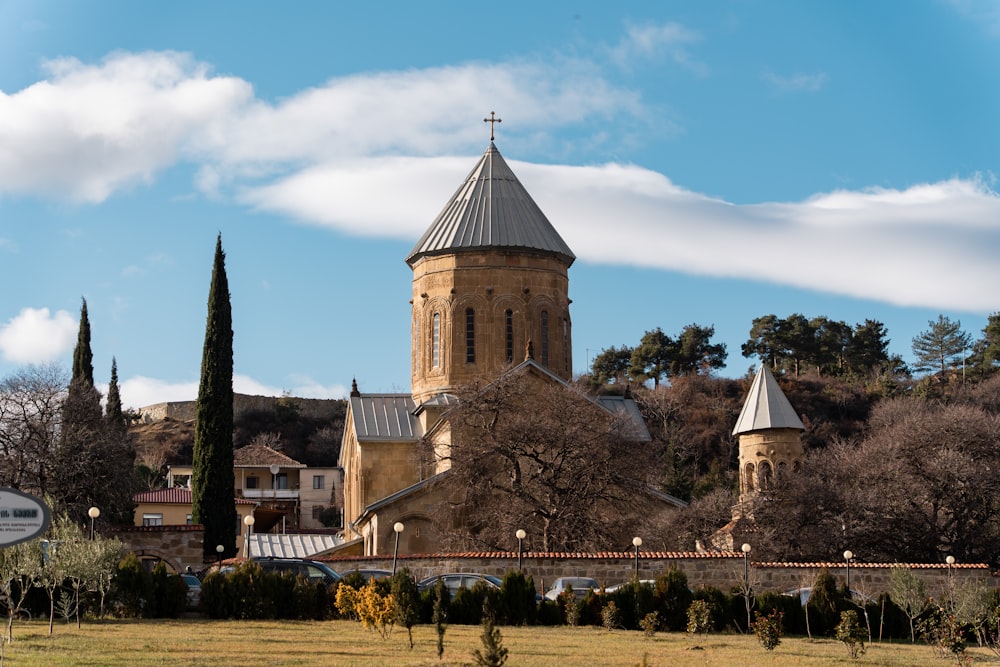 a church with a steeple and a clock tower