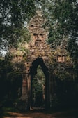 a stone structure with a doorway in the middle of it
