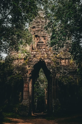 a stone structure with a doorway in the middle of it