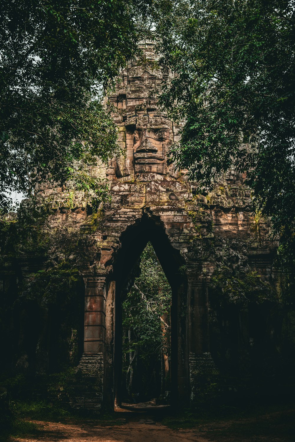 a stone structure with a doorway in the middle of it