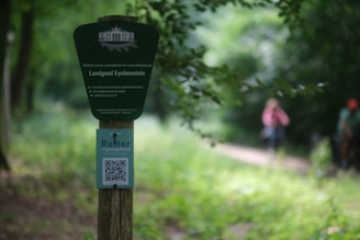 Visual representation of environmental indicators and QR code scanning in a forest restoration project.