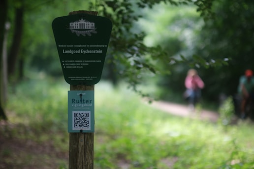 Visual representation of environmental indicators and QR code scanning in a forest restoration project.