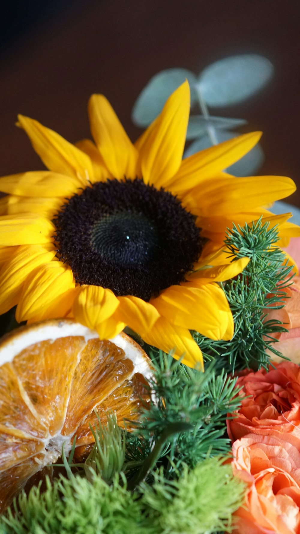 a close up of a plate of food with a sunflower