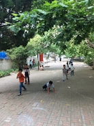 A group of children playing in a safe outdoor space.