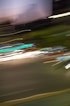 a blurry photo of a city street at night