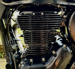 A close-up of a sleek motorcycle engine with intricate details.