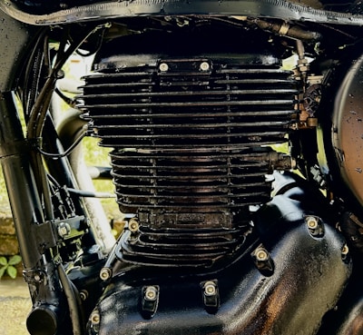 A close-up view of a 3D motorcycle engine with realistic textures.