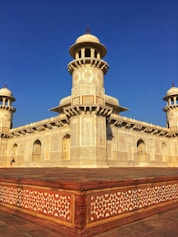 a large building with two towers on top of it