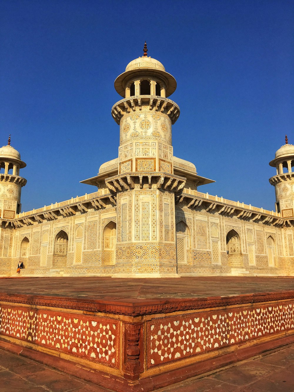 a large building with two towers on top of it