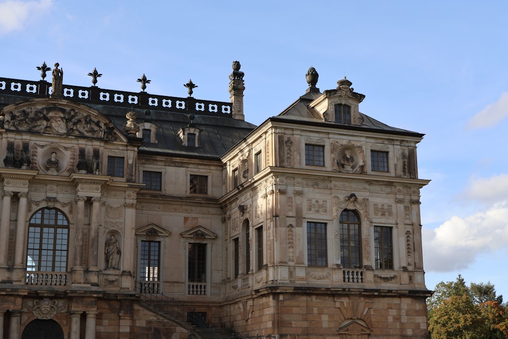 a large building with a clock on the top of it